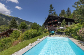 Chalet authentique luxe piscine